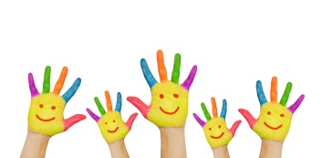 Five hands painted with smiling faces