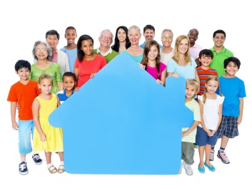 Group of Adults & Children with image of house